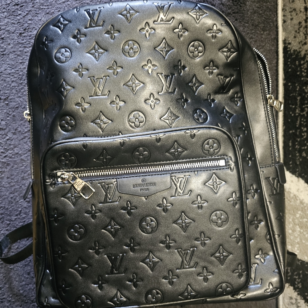 Louis Vuitton Black Backpack with Iconic Design